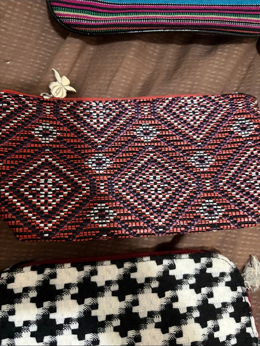 7 Sisley cosmetic bags